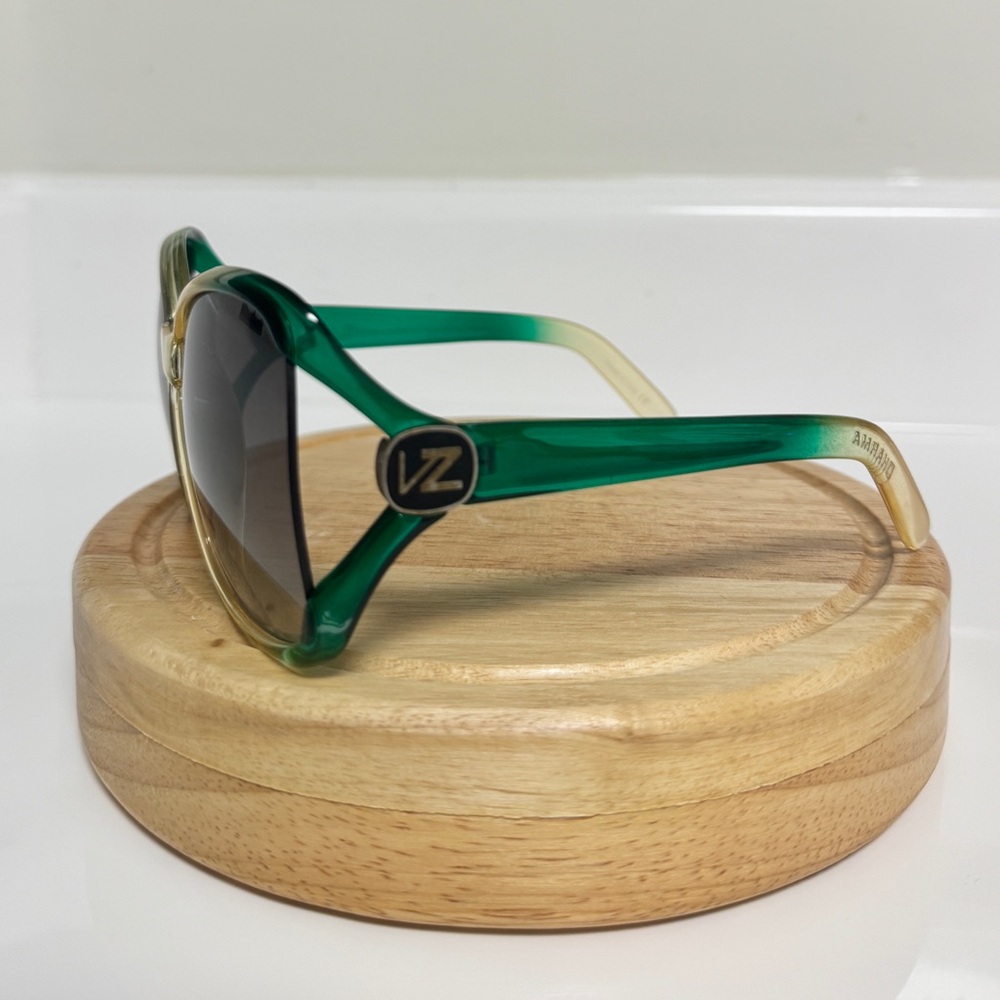 Green ans yellow Von Zipper sun glasses.